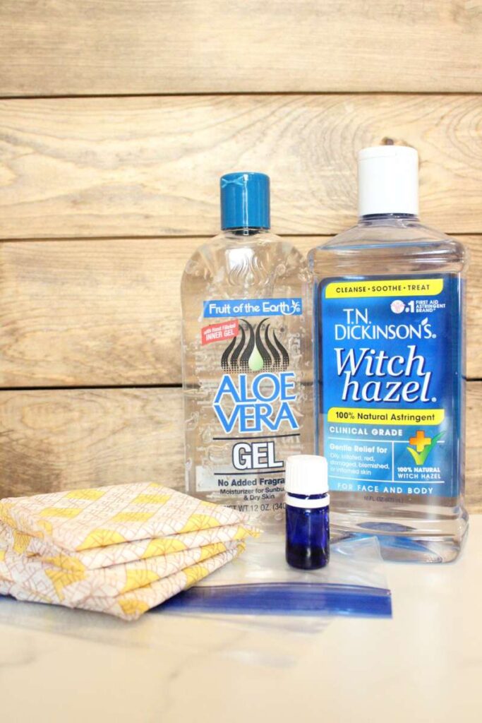 picture showing a bottle of witch hazel, aloe vera gel, essential oils, ziploc, and maxi pad