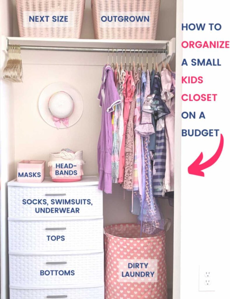 kids closet with clothing rod, hamper, plastic drawer set, and a shelf on top with fabric bins